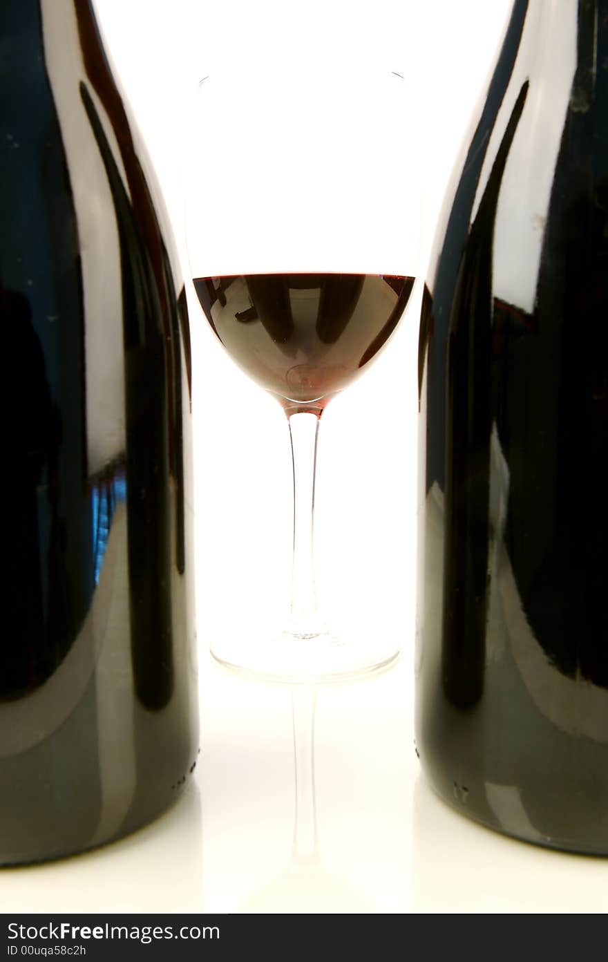 Red and white wine isolated against a white background. Red and white wine isolated against a white background