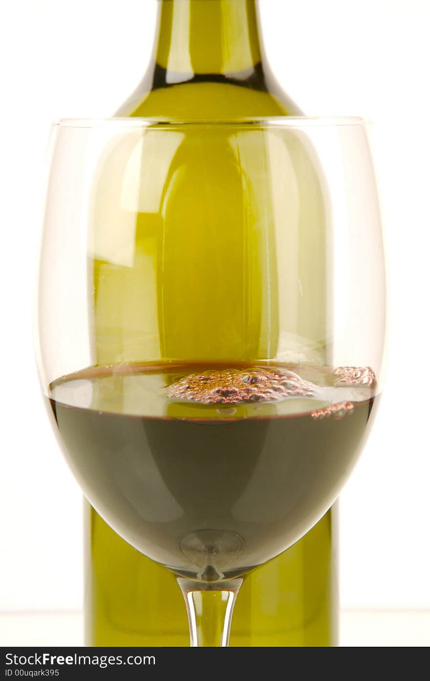 Red and white wine isolated against a white background. Red and white wine isolated against a white background