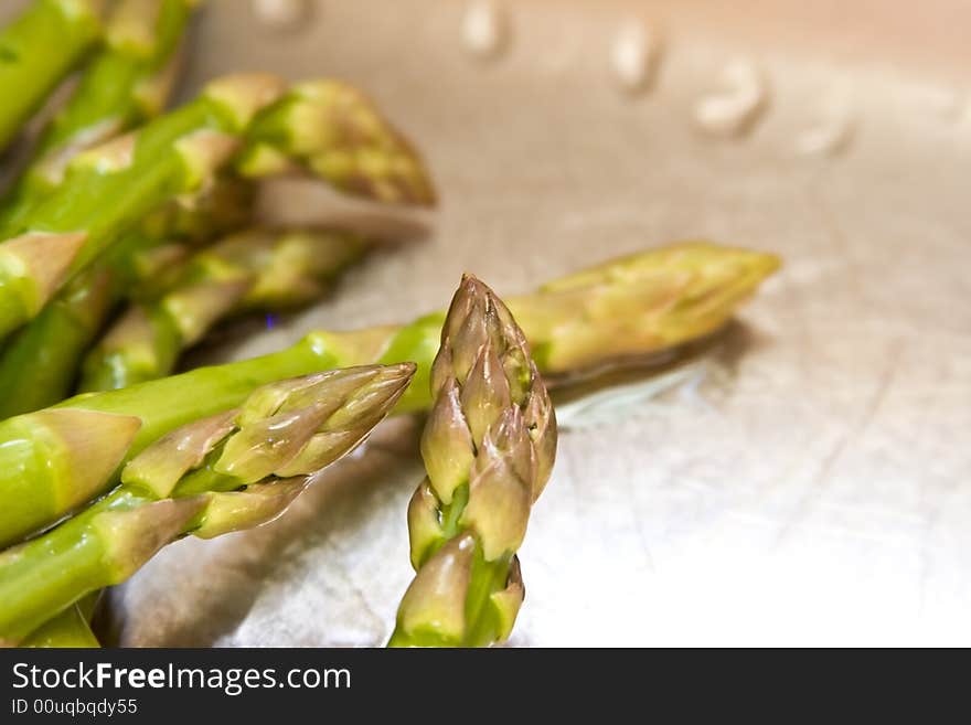 Washing asparagus shot with a macro lens getting ready for a healthy dinner. Washing asparagus shot with a macro lens getting ready for a healthy dinner