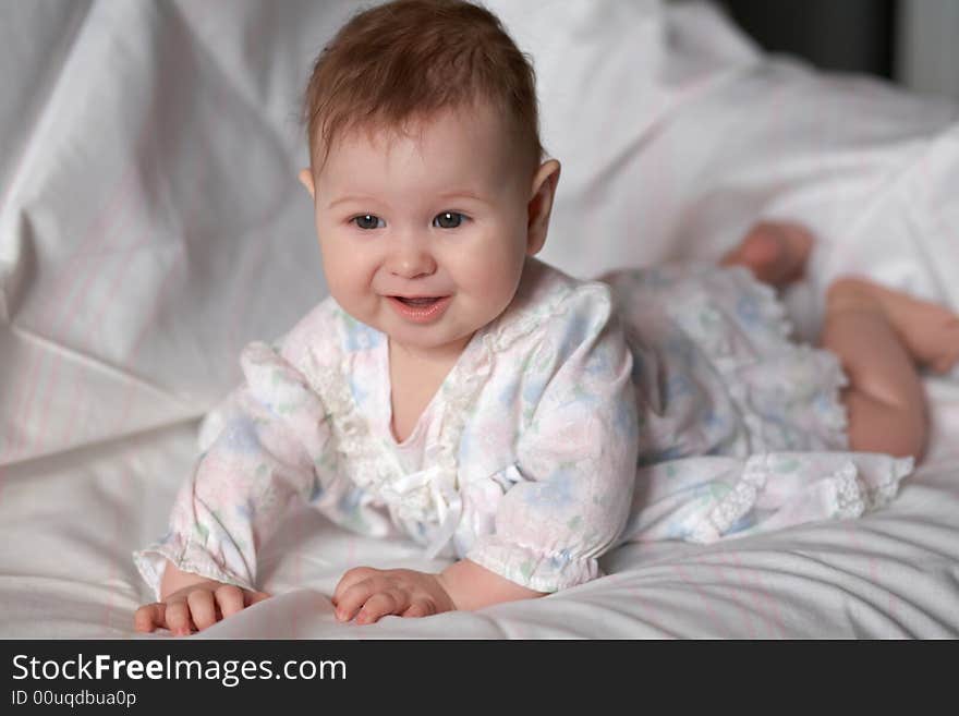 An image of bay-girl on the bed. An image of bay-girl on the bed