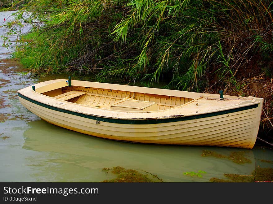 Photograph featuring an old rowboat on the River Murray at Customs House, Border Cliffs (Australia). Photograph featuring an old rowboat on the River Murray at Customs House, Border Cliffs (Australia).