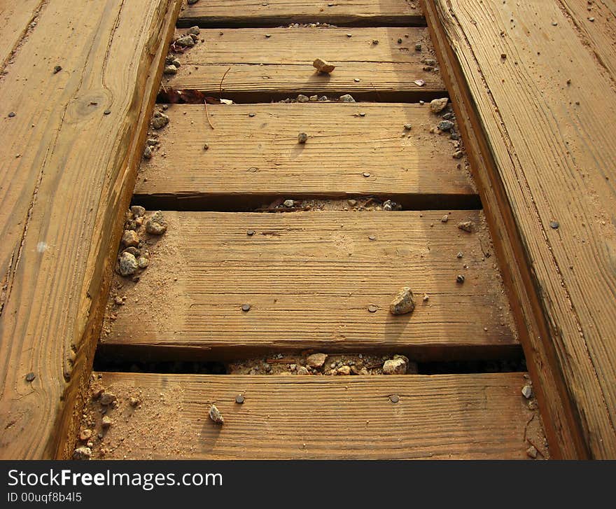 Closeup of the planks of a bridge over a small creek in Mid-West Georgia. Closeup of the planks of a bridge over a small creek in Mid-West Georgia.