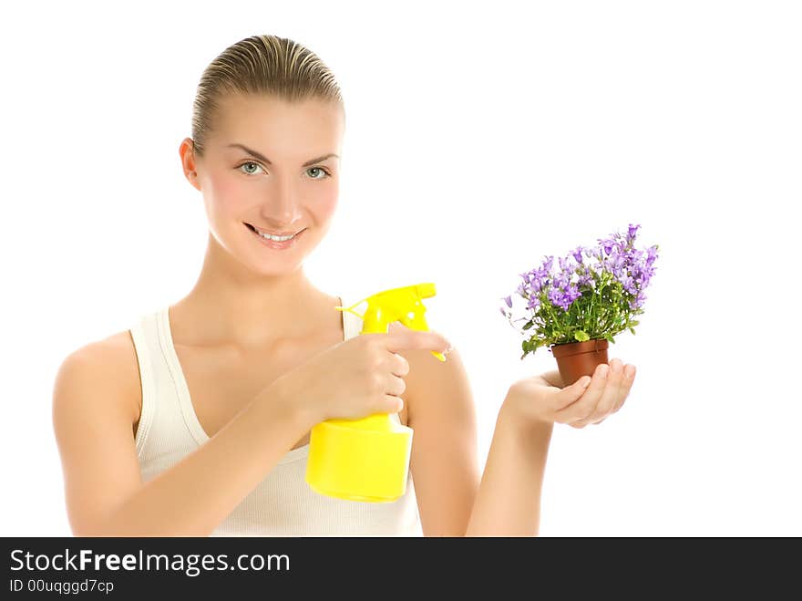 Beautiful young woman maintaining flower. Isolated on white background