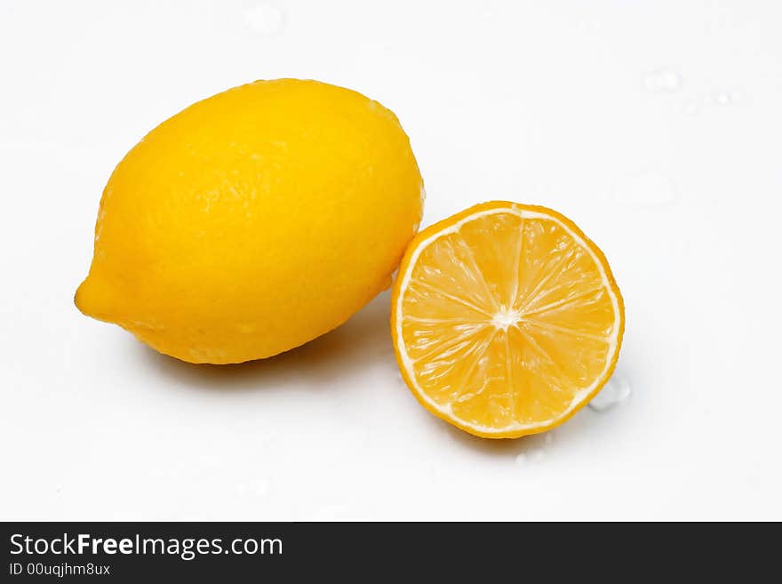 Yellow lemons on white background