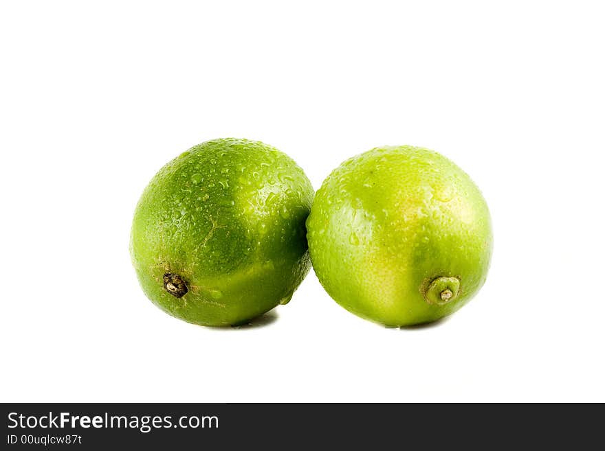 Lime Fruits With Water Drops Isolated