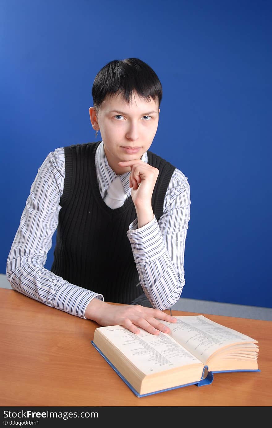 Teenager reading a book