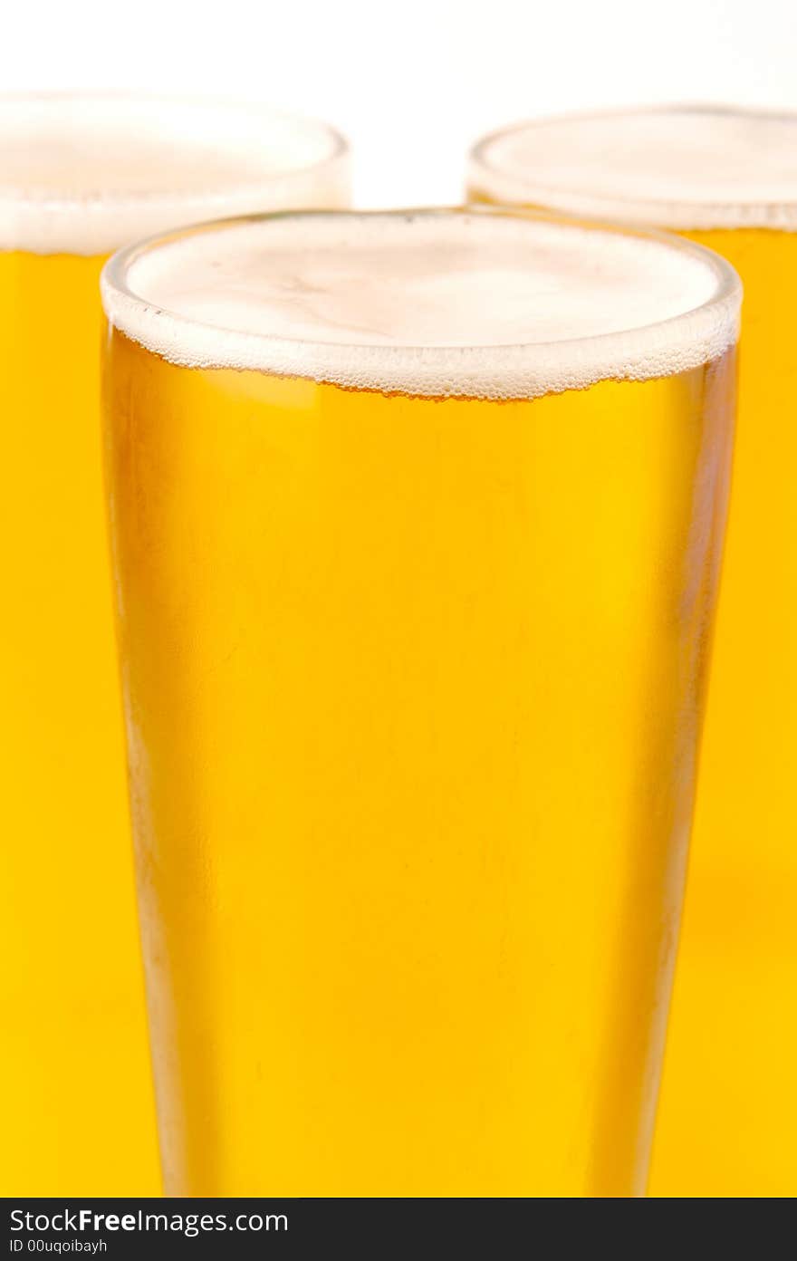 Ice cold beers isolated against a white background