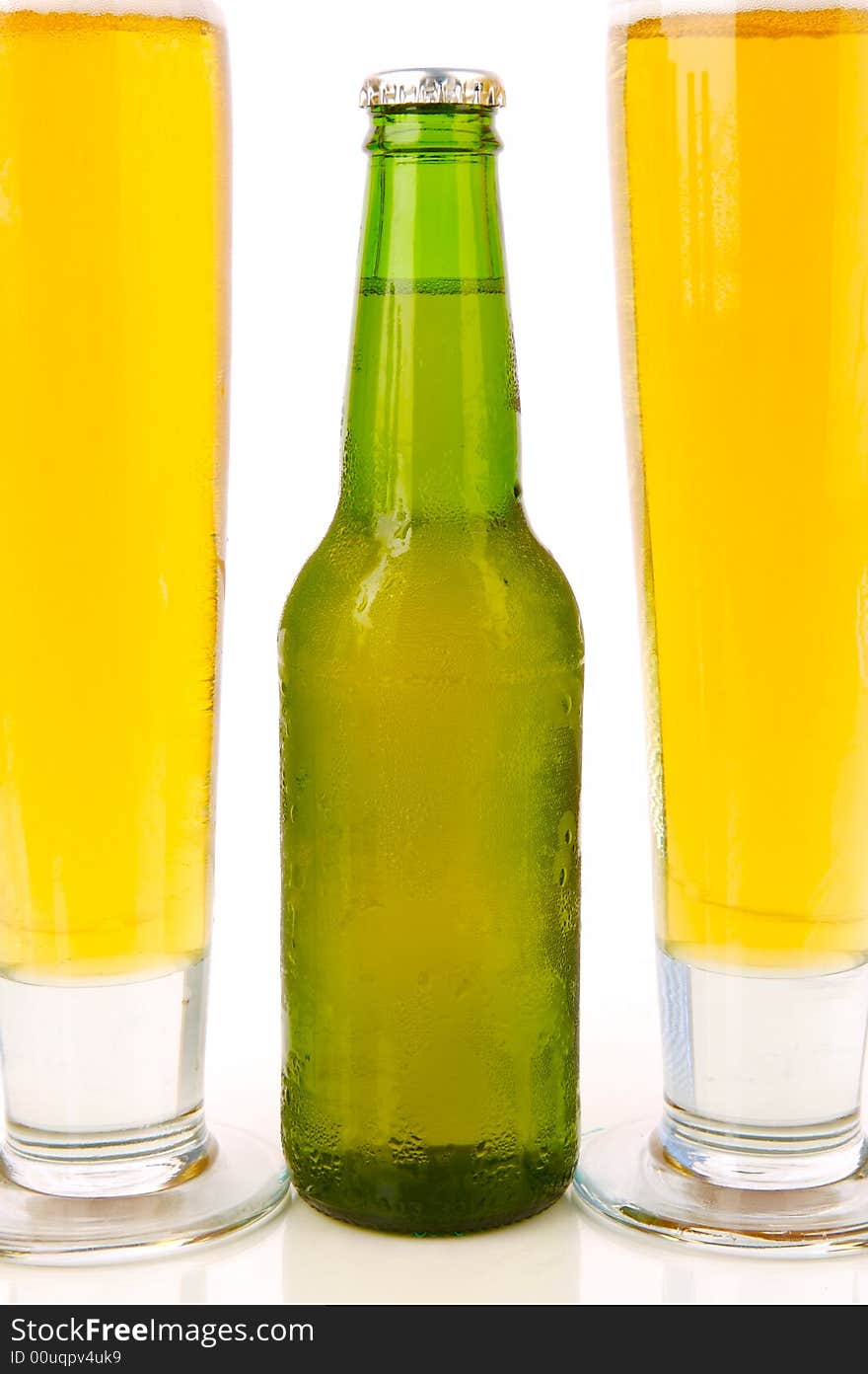 Ice cold beers isolated against a white background