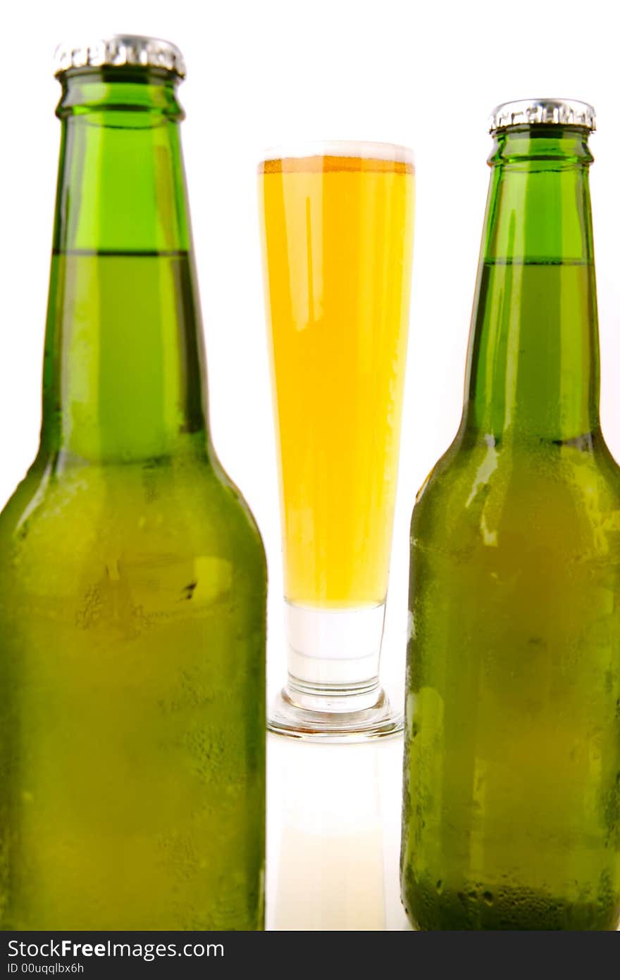 Ice cold beers isolated against a white background