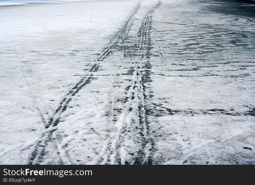 Car track on the stood pond. Car track on the stood pond