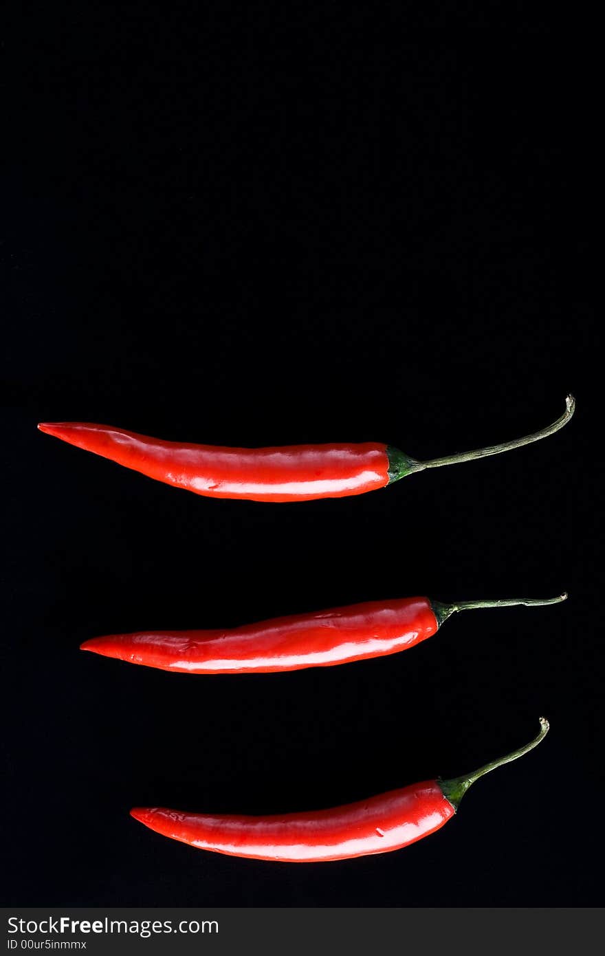 Three Chili Peppers