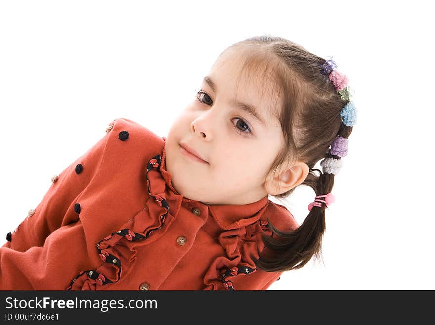 The little sitting girl isolated on a white background