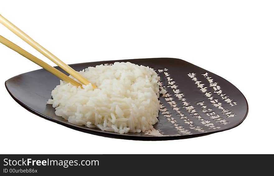 Isolated rice on the plate with hieroglyphes. Isolated rice on the plate with hieroglyphes