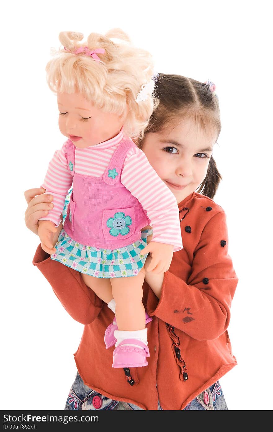 The little girl with a doll isolated on a white background