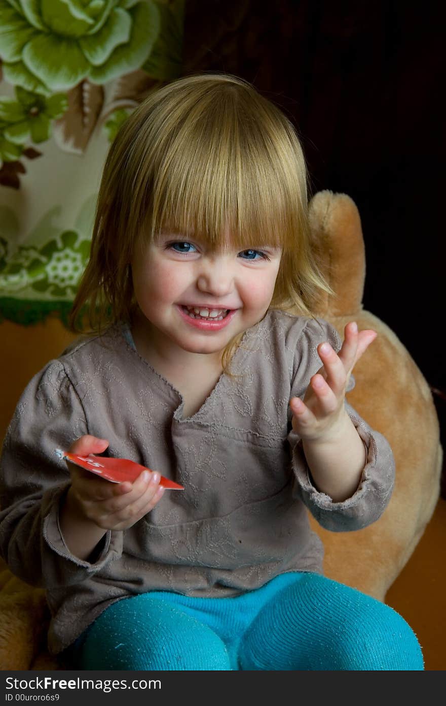 The little girl with a card. The little girl with a card