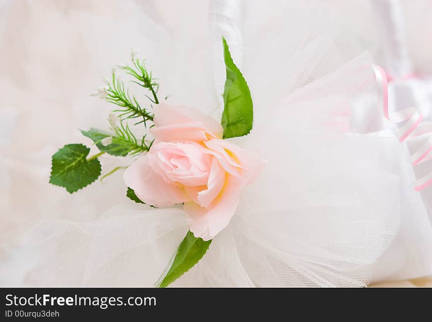 Artificial rose flower on the clothing