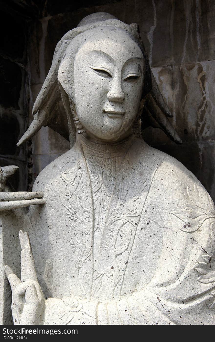 Thailand, Bangkok: Wat arun temple; stone statue of a chinese