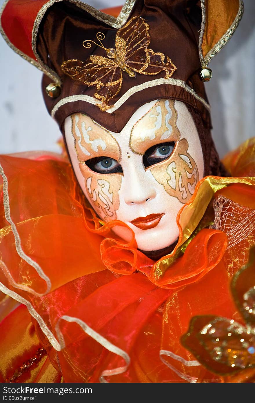 Orange butterfly costume at the Venice Carnival