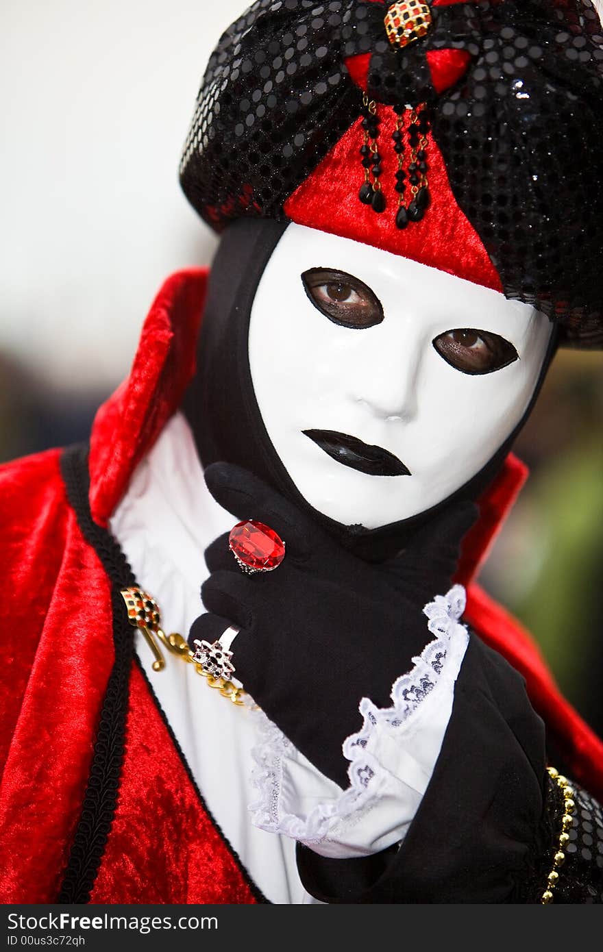 Red and black costume at the Venice Carnival. Red and black costume at the Venice Carnival