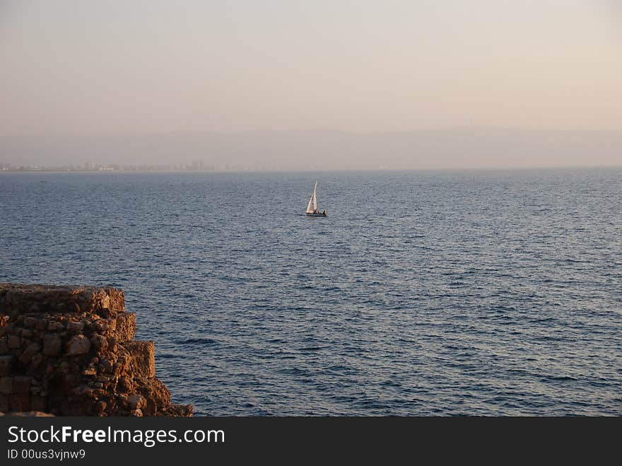 The Sail Lonely Grows White...