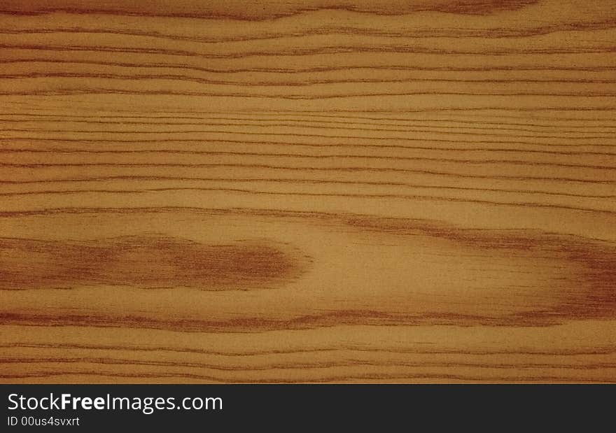 Wood grain background texture spotlit. Wood grain background texture spotlit