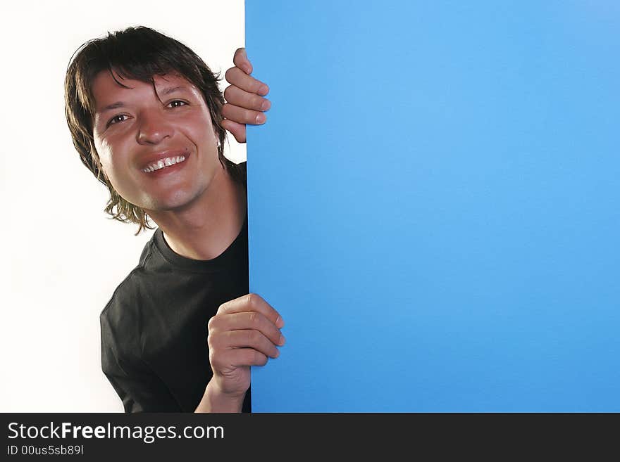 Man with smile holding a blue billboard. Man with smile holding a blue billboard