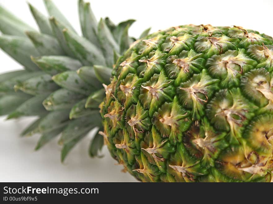 Close-up fresh pineapple ready to be sliced for desert or salad. Close-up fresh pineapple ready to be sliced for desert or salad