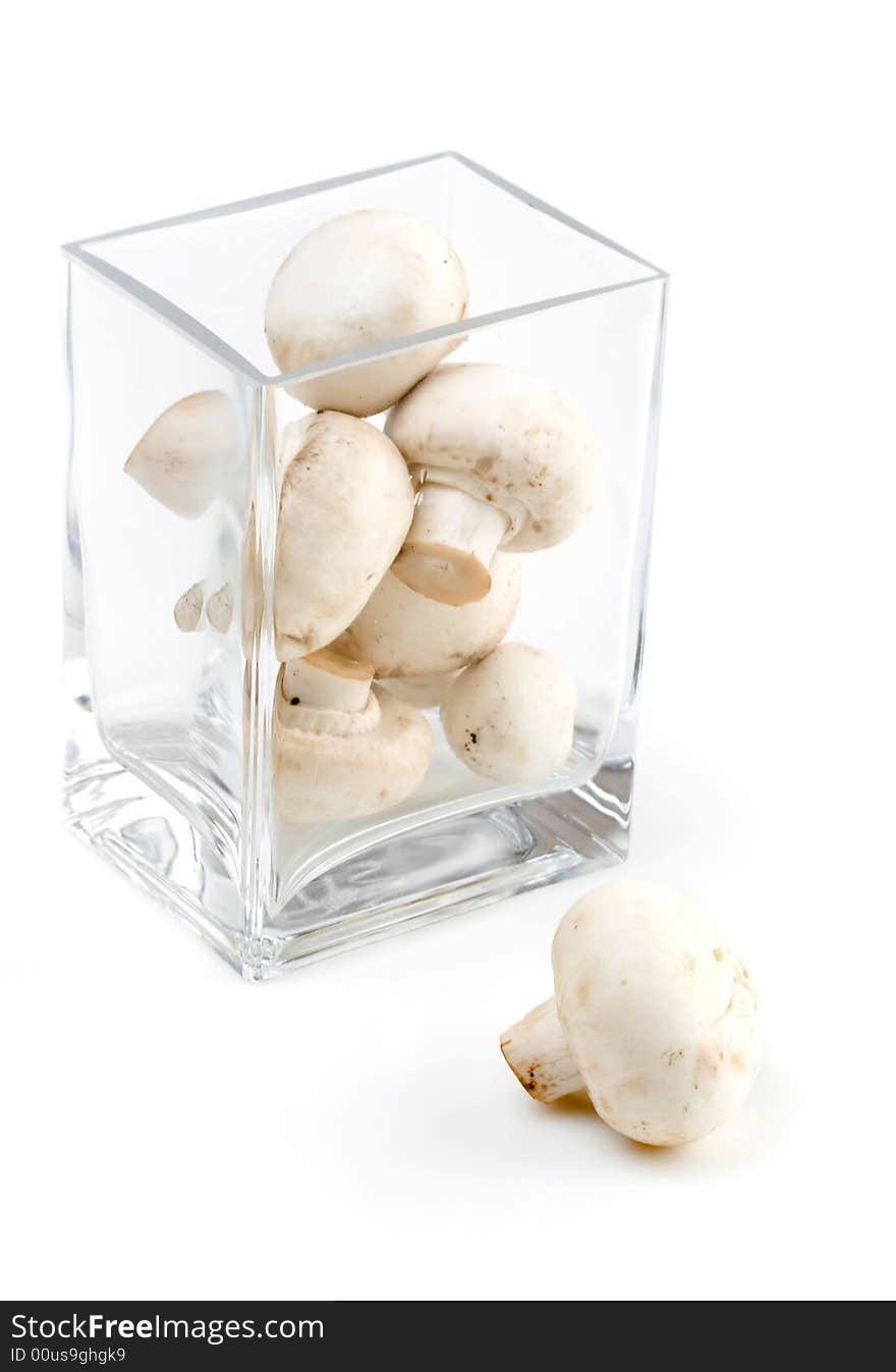 Mushrooms in a glass vase, healthy diet. Mushrooms in a glass vase, healthy diet