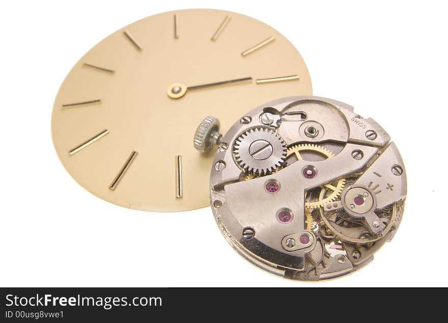 Detailed view of watch mechanism and clock scale on the white background. Detailed view of watch mechanism and clock scale on the white background