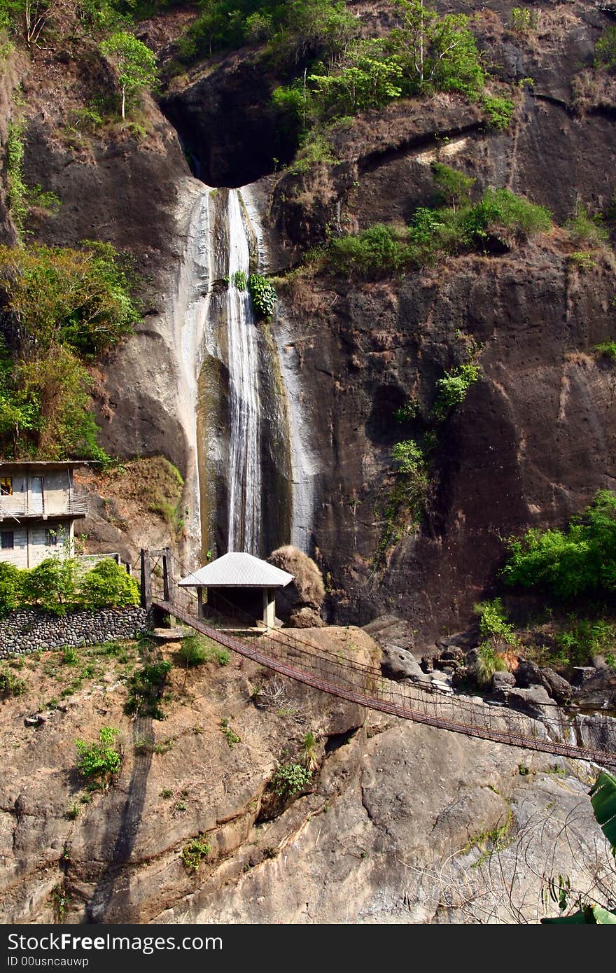 Overlooking waterfalls with hanging bridget beneath