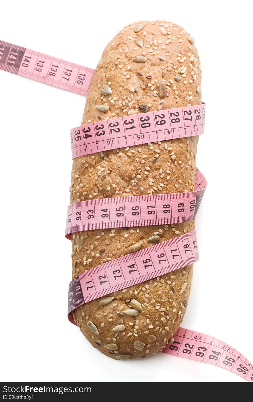 Bread wrapped with a measurement tape on a white background