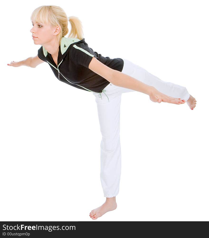 Young blondy doing yoga exercise