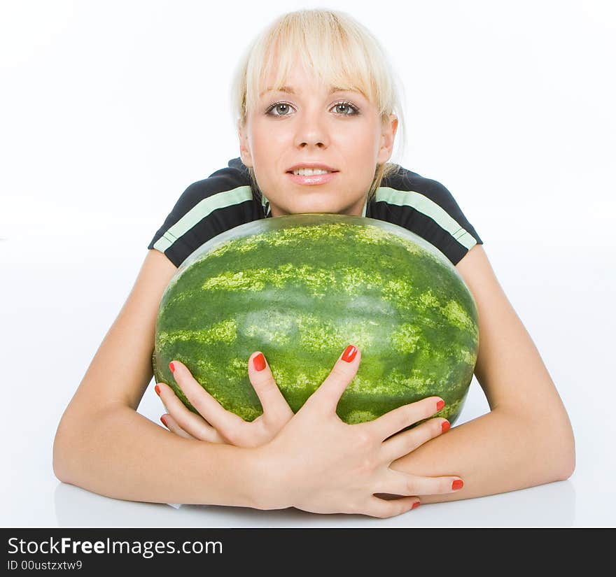 Beautiful young fruit-grower love to embrace water-melon