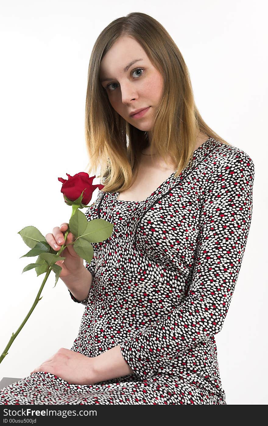 Woman with a rose on a white background