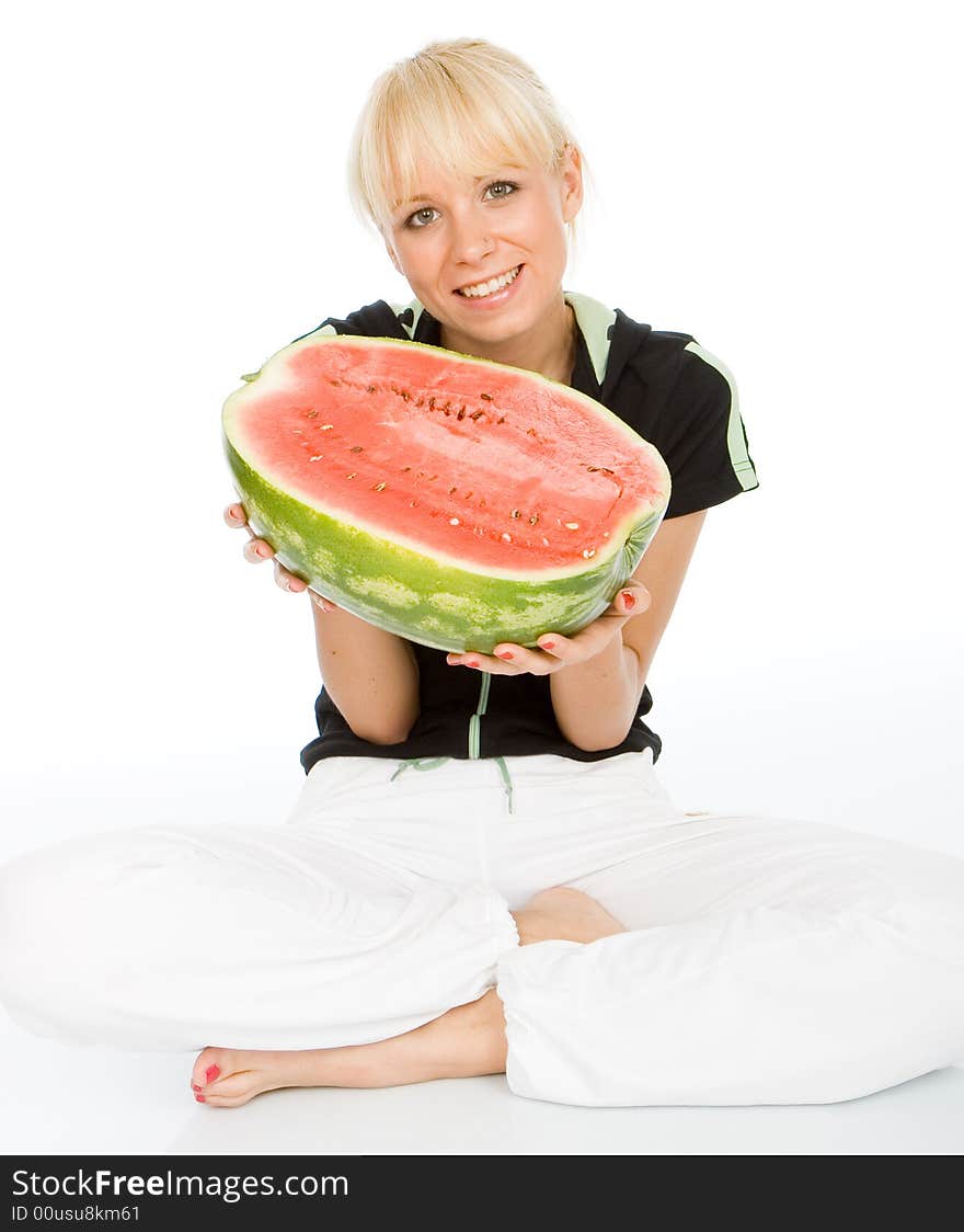 Beautiful young fruit-grower hold on a water-melon