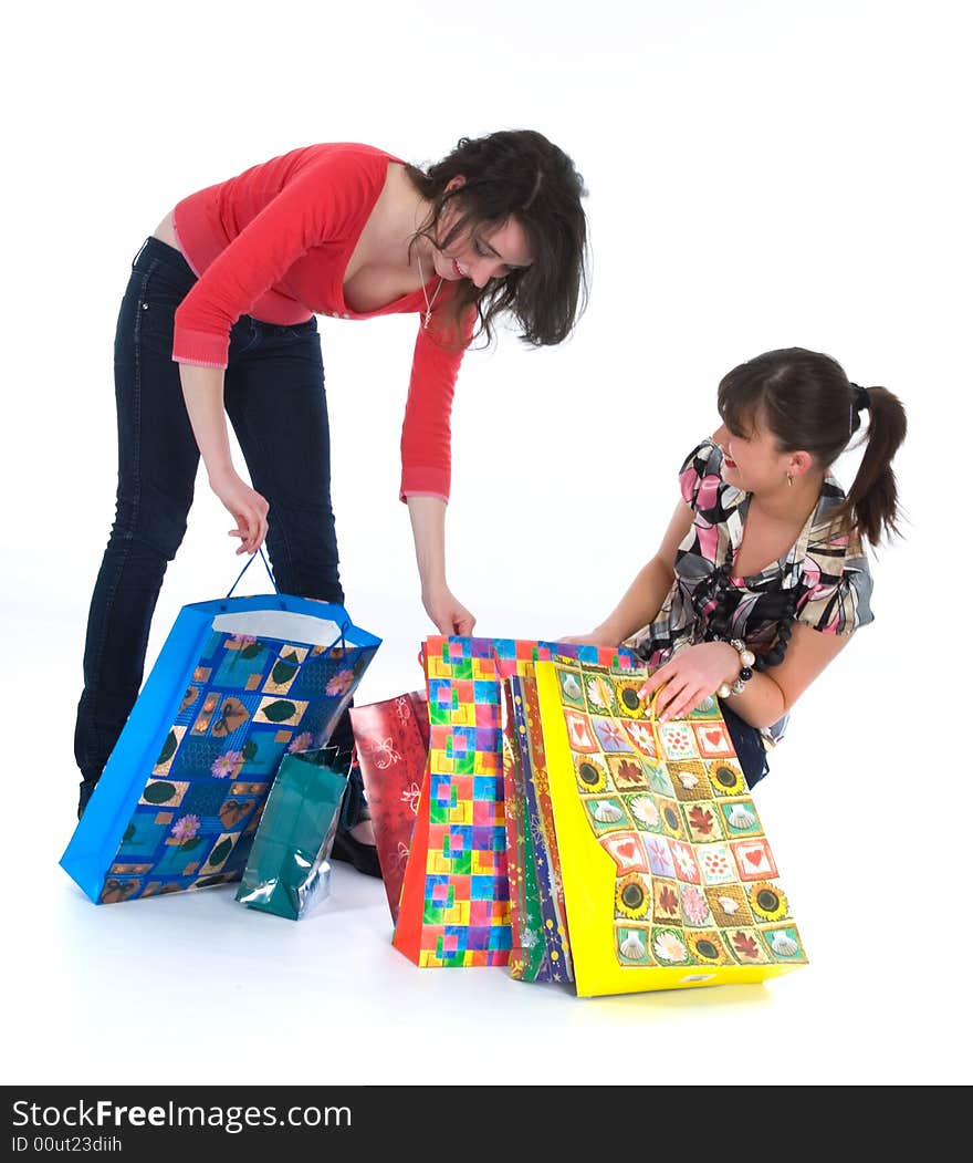 Expressive girls  on white background  shopping. Expressive girls  on white background  shopping