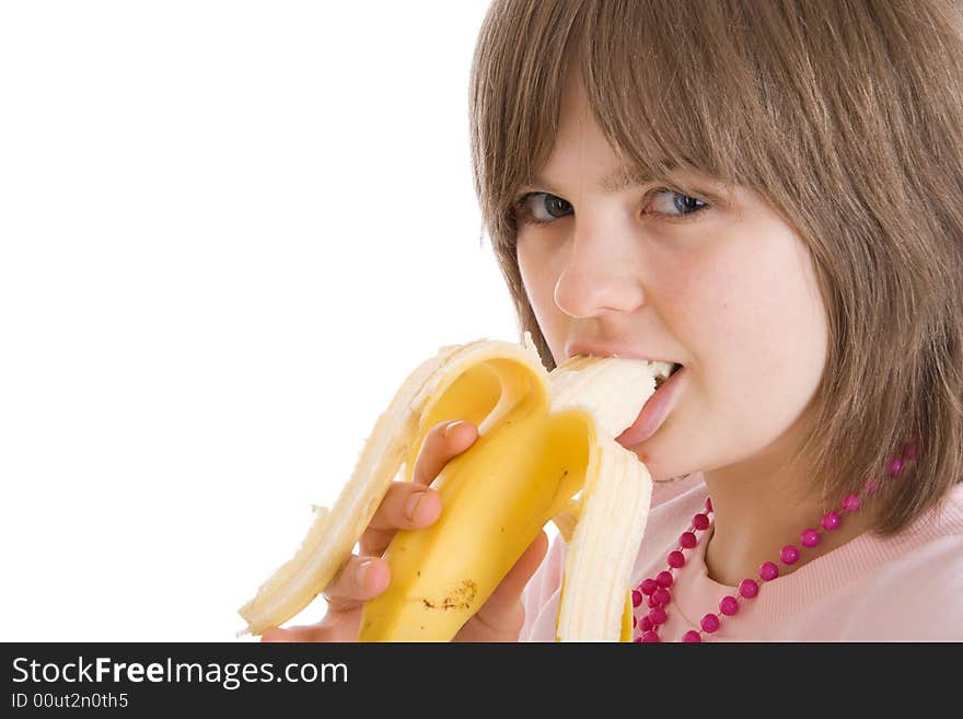 The young attractive girl with a banana isolated on a white background