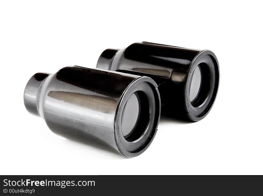 Old black binoculars isolated on white background