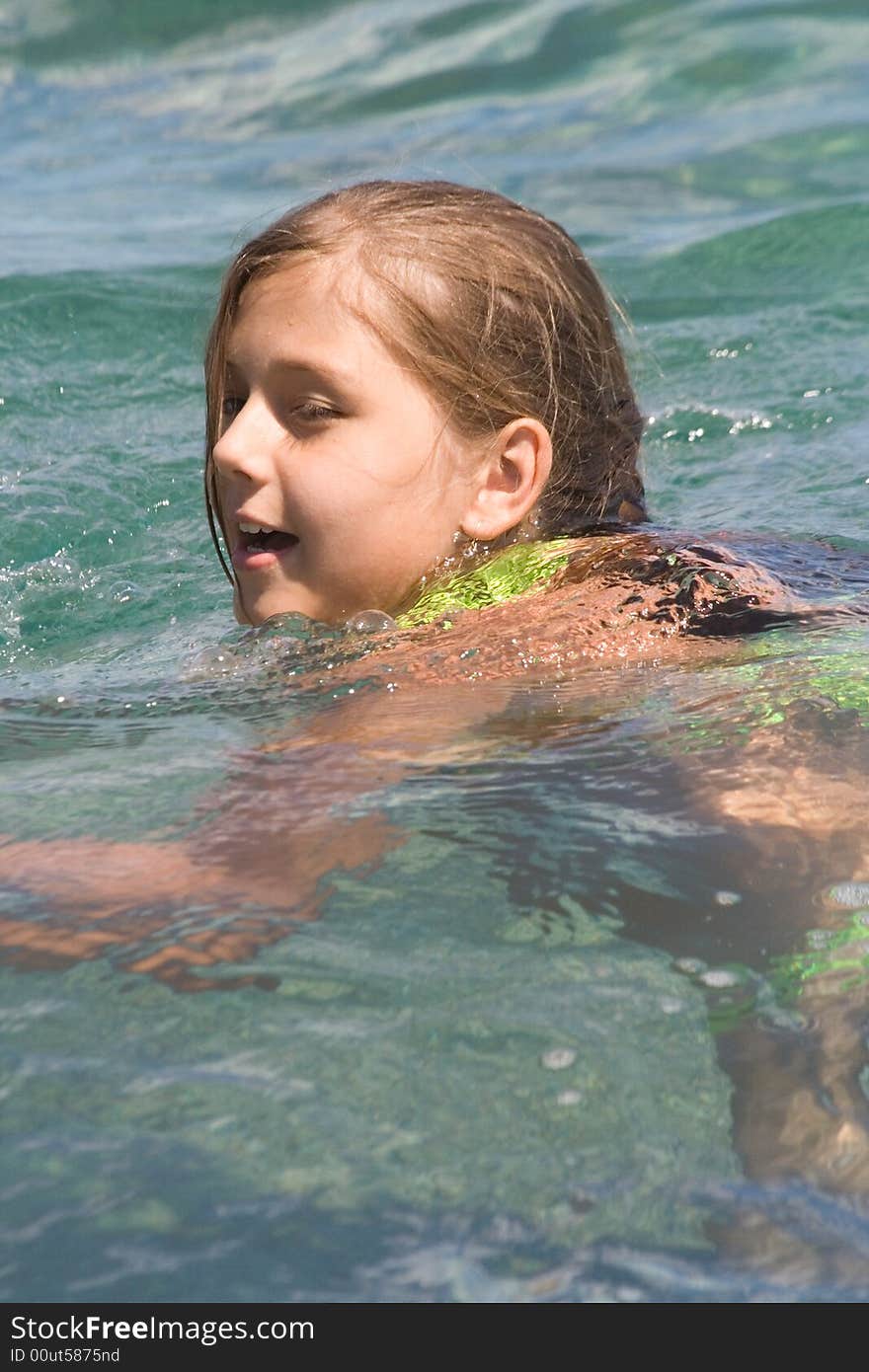 Girl-teenager among waves in a sea. Girl-teenager among waves in a sea