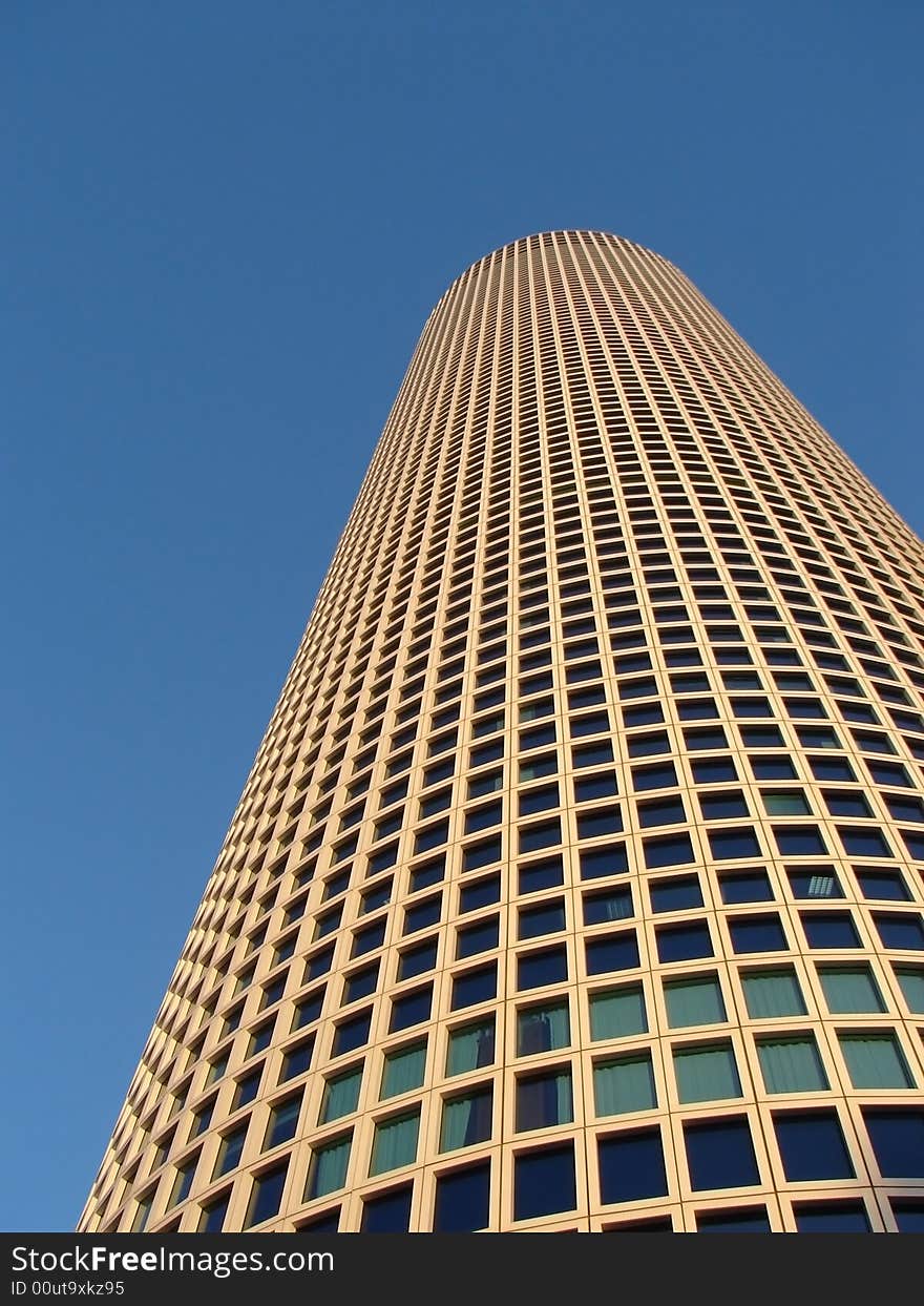 Skyscraper on a background of the blue sky