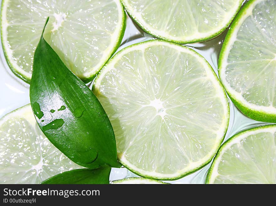 Green yuicy lime with green leaf. Green yuicy lime with green leaf