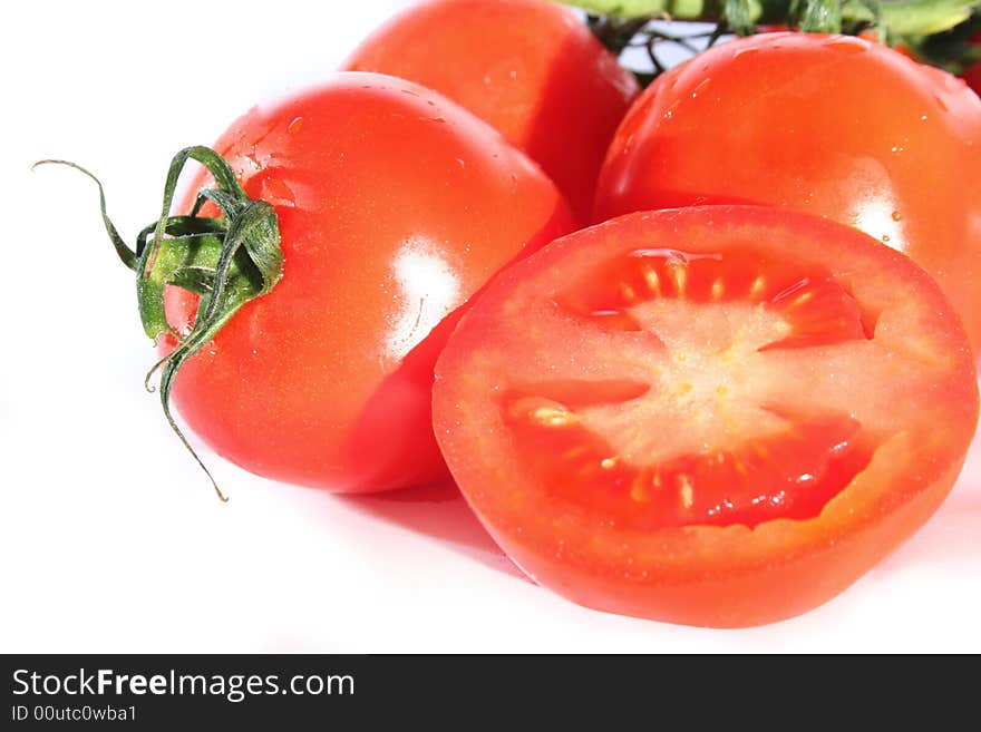 Fresh red tomatoes isolated on white background. Fresh red tomatoes isolated on white background