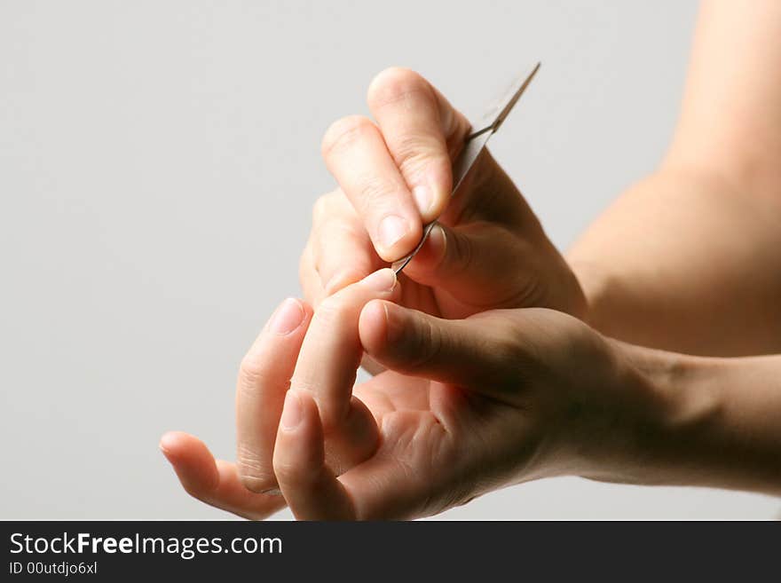 A manicure. A hand of a young woman