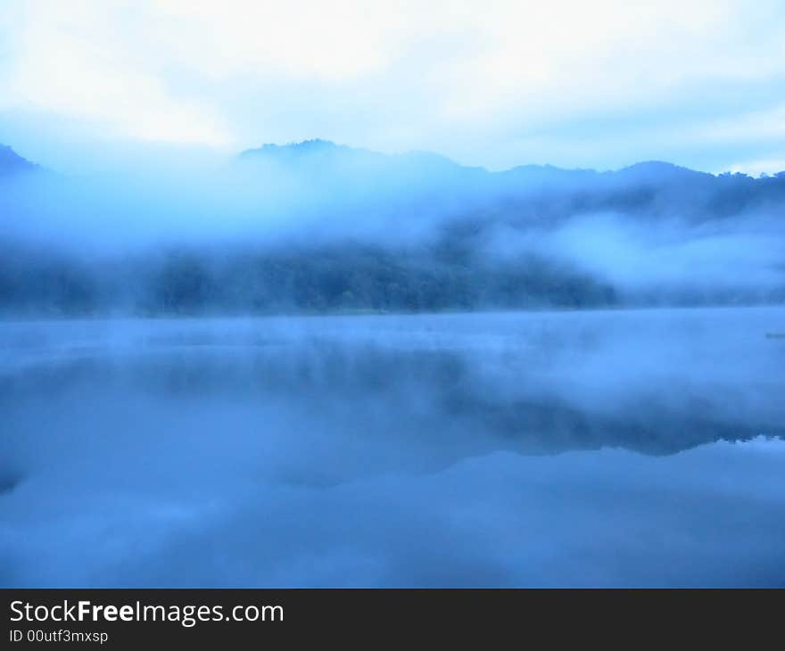 The Shadow Of Hill On The Lake Surface