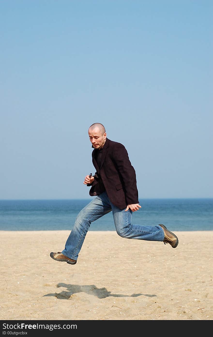 Happy man jumping on sky background. Happy man jumping on sky background