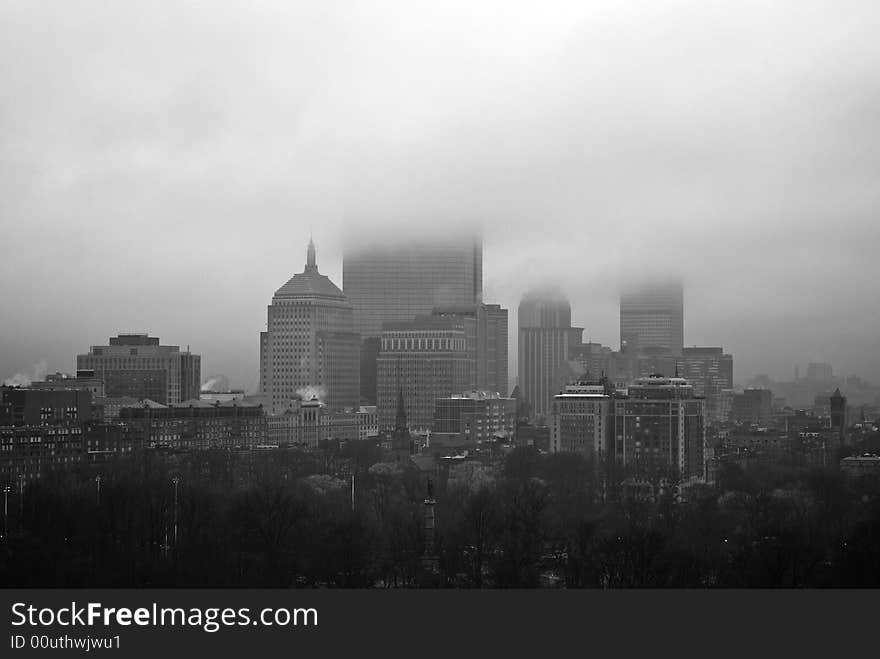 View of boston buildings obscured by clouds on a rainy morning in spring. View of boston buildings obscured by clouds on a rainy morning in spring