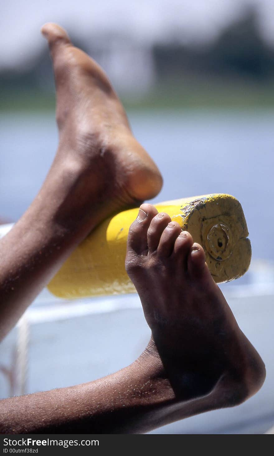 Man is steering a boat