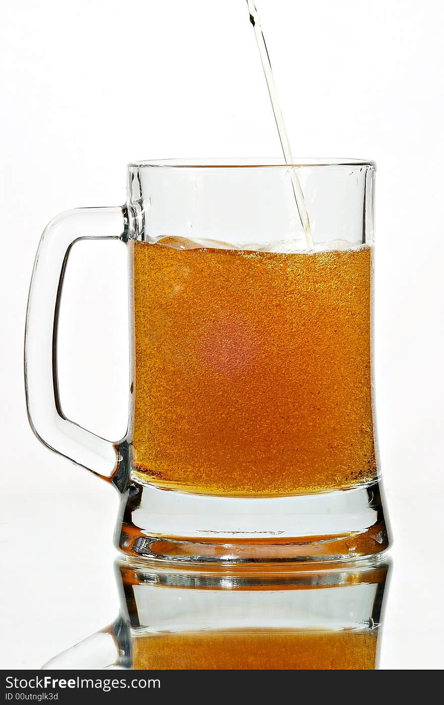 Beer in glass on the white background