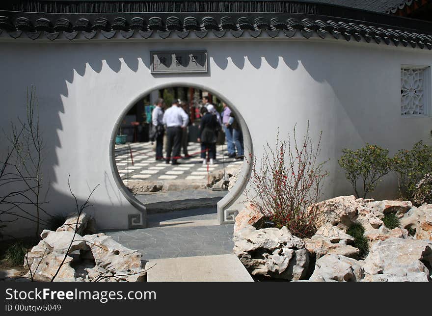 White wall with circular entrance and black edging. White wall with circular entrance and black edging.