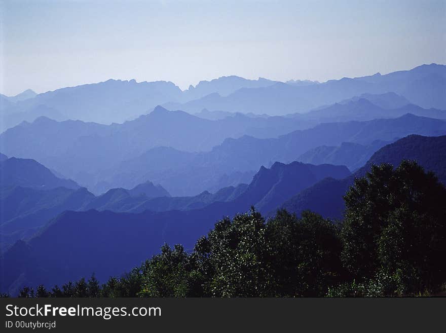 Mountains and clouds in early morning light